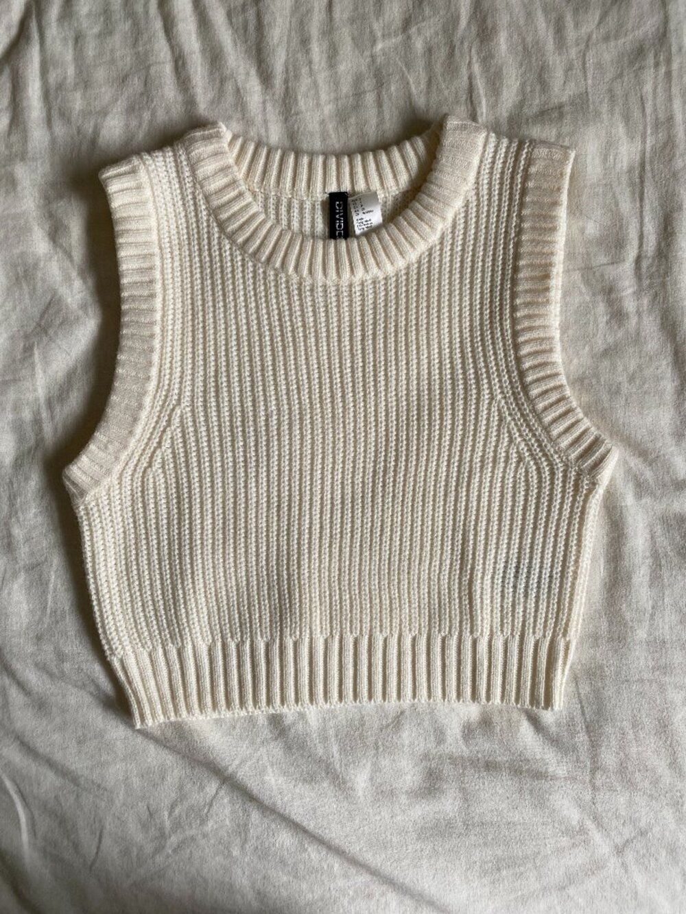 Beige sweater vest